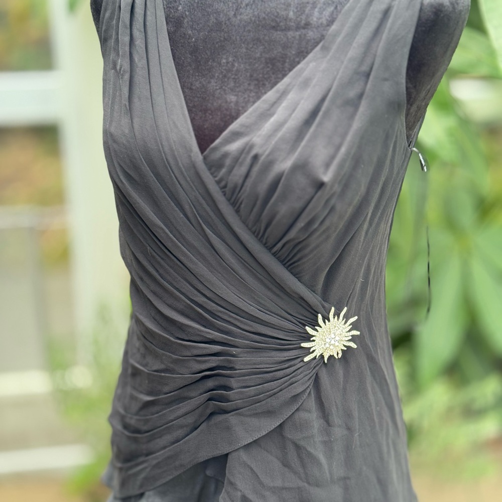Elegant black Dress with Floral Accent
